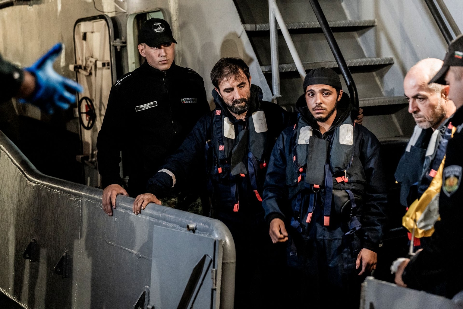 Rescued sailors from a ship attacked by a drone arrive at the port of Varna, Bulgaria, on Oct. 13, 2026.