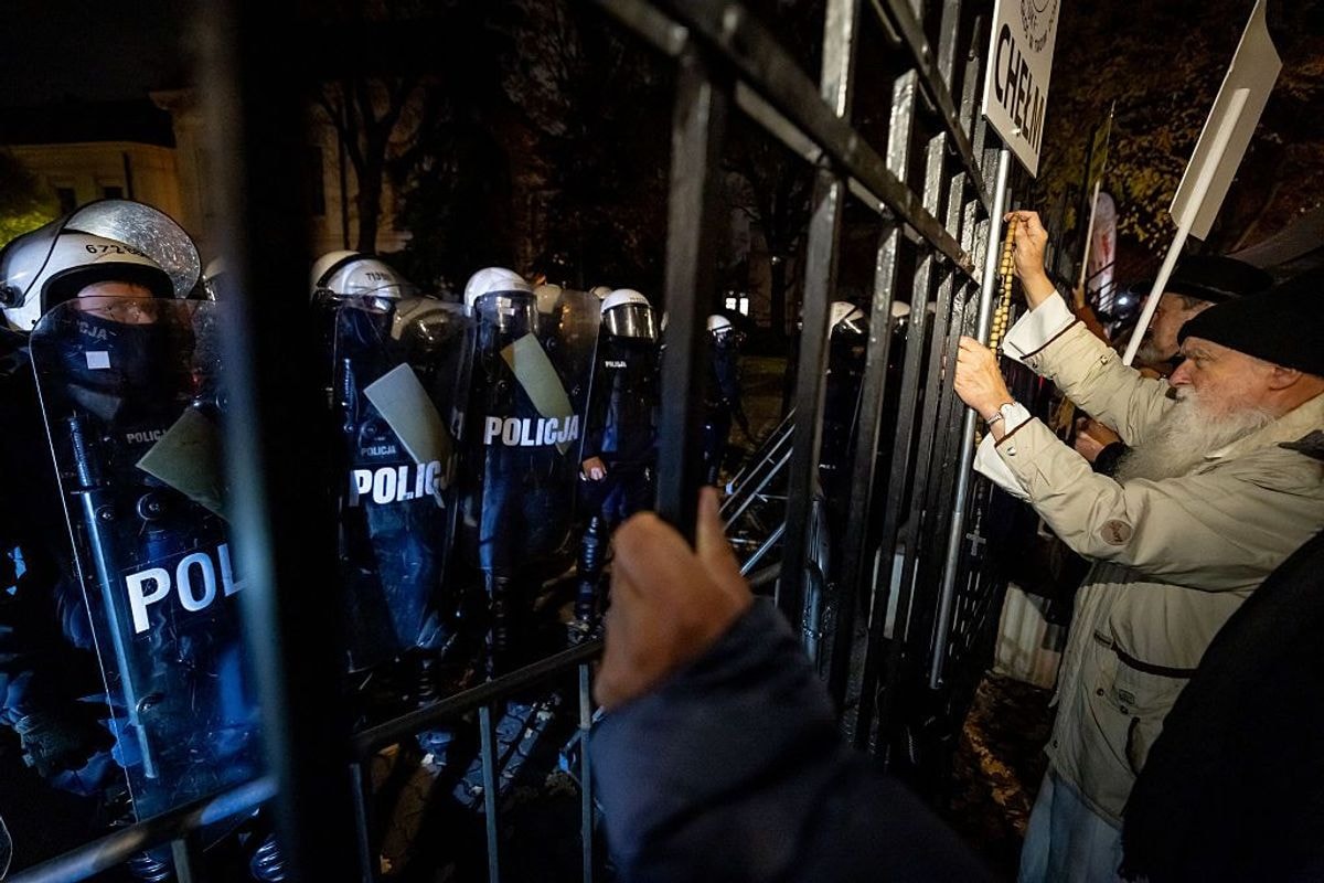 Protesters gather outside the headquarters of the Poland's Constitutional Court in Warsaw.