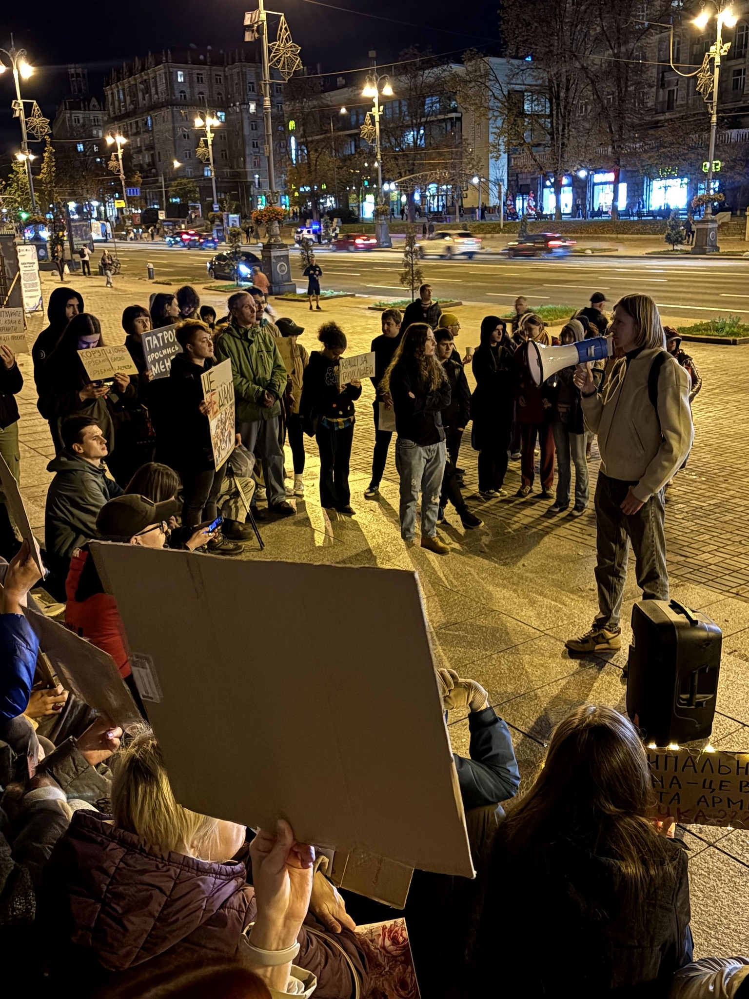 Protesters gather on the steps of a government building in Kyiv, Ukraine, on Sept. 23, 2026.