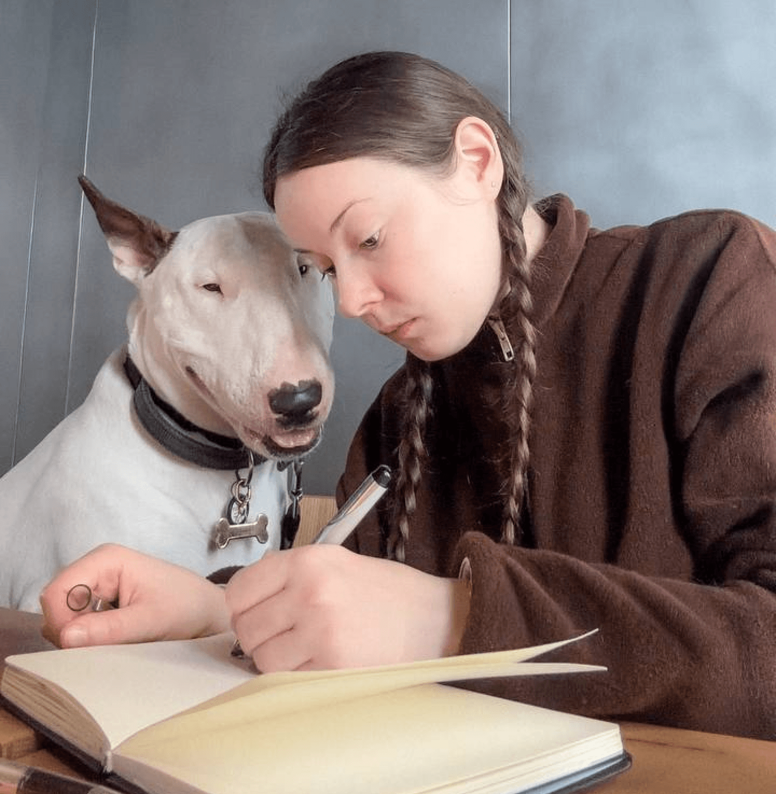 Artist Oliana Moroz, author of the illustration for the Companion Collection š¾ and her dog