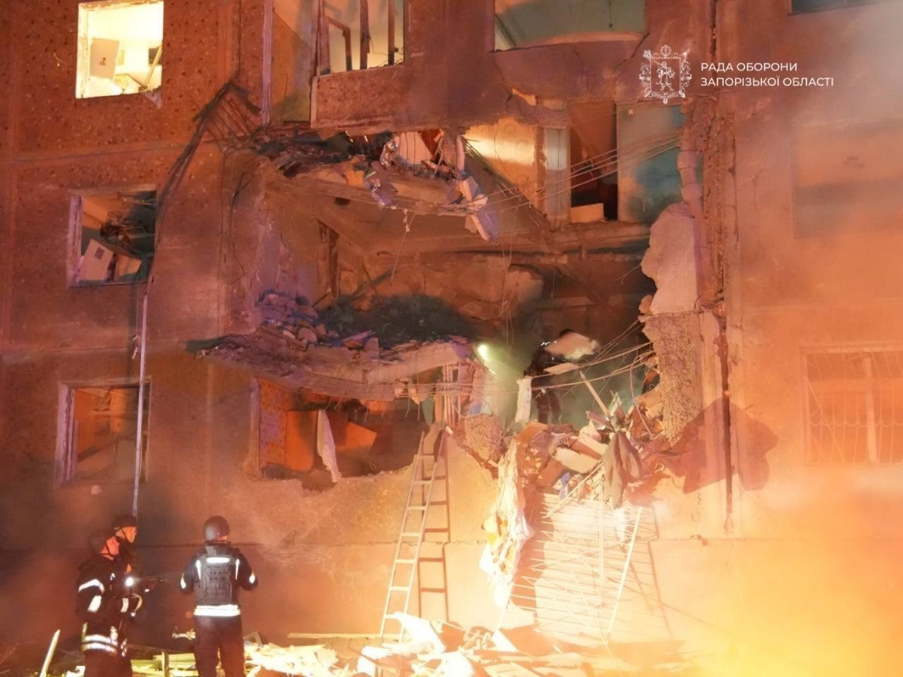 A fire at an apartment that was hit in a Russian guided bomb attack.