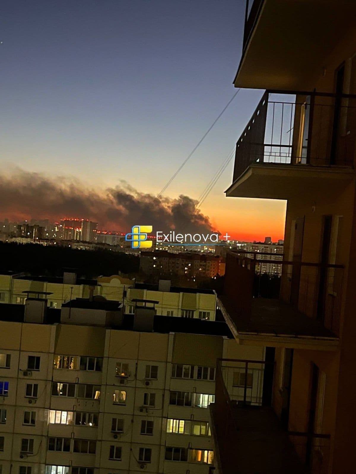 A photograph reportedly showing smoke rising from drone impacts in Voronezh.