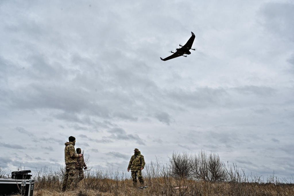Soldiers are seen during a demonstration flight of a drone handed over to them by volunteers in Zaporizhzhia, southeastern Ukraine. (Dmytro Smoliyenko / Ukrinform/Future Publishing via Getty Images)