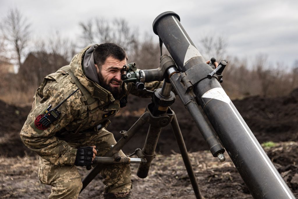 Eyeing victory in 2023, Ukrainians meet New Year with prayers for loved ones on battlefield