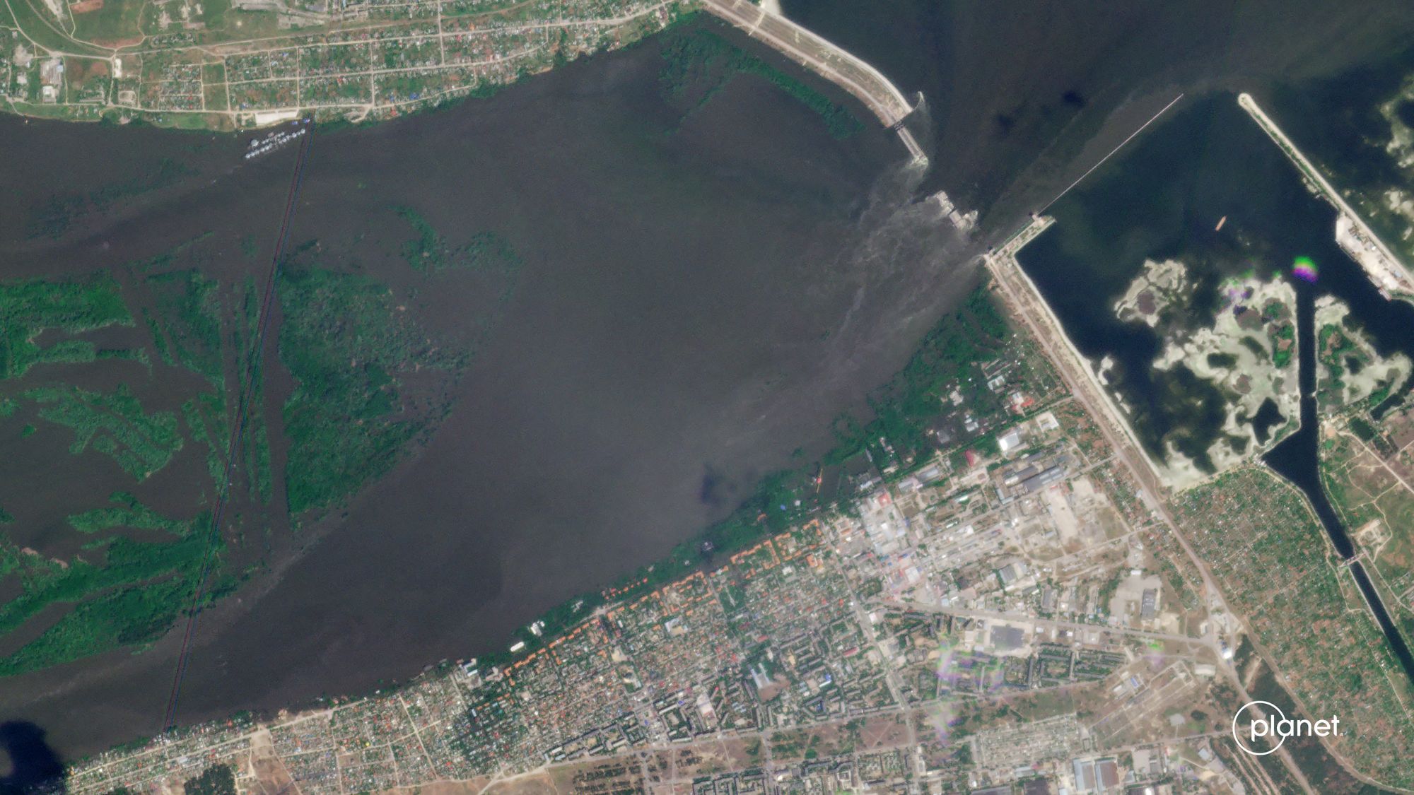 Satellite image of the Kakhovka dam breach. (Source: Planet Labs)