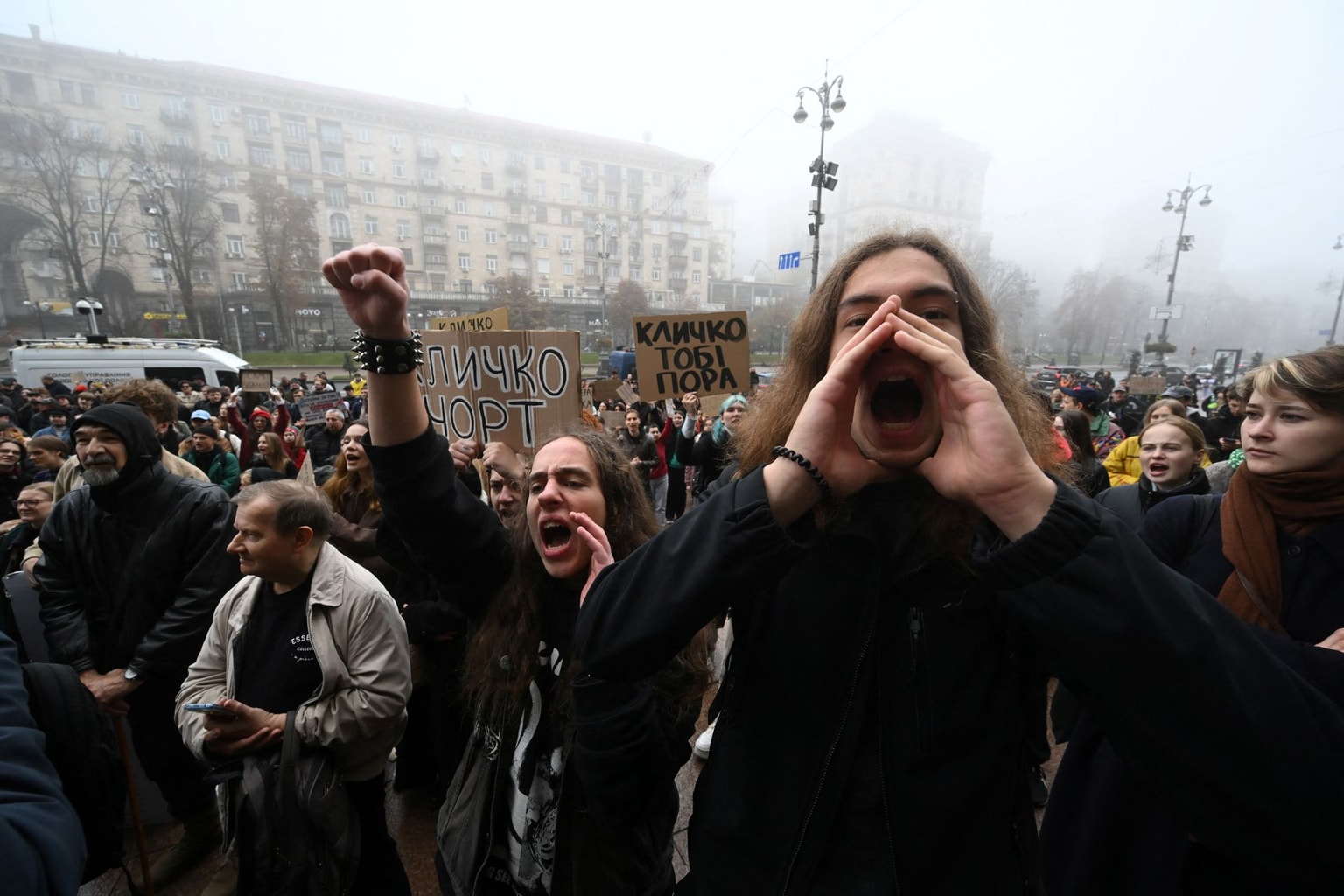 Demonstrators, holding banners, gather outside the Kyiv City Council building on Khreshchatyk Street to demand the resignation of Kyiv Mayor Vitali Klitschko in Kyiv, Ukraine, on Oct. 17, 2026. (Sergei Supinsky / AFP via Getty Images)